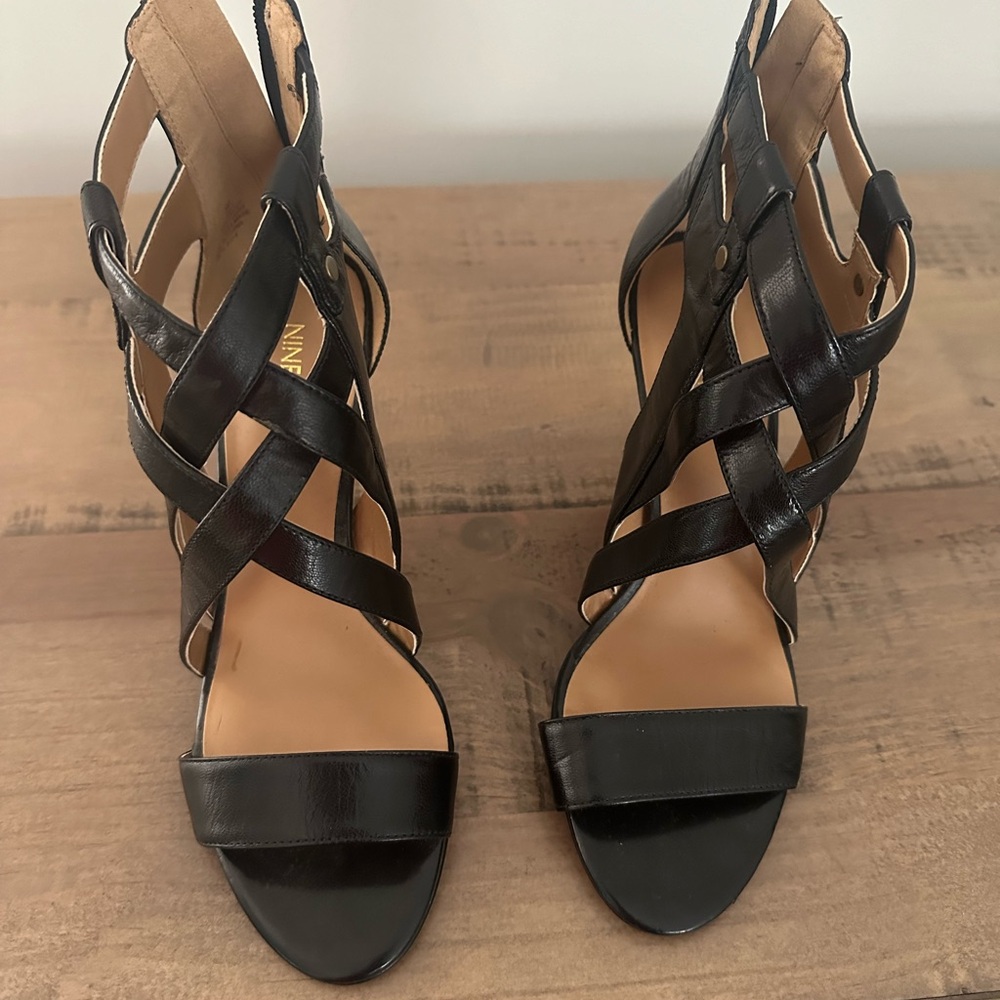 Nine West 3in black zip heels. Size 7.